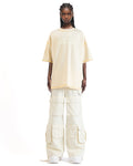 Front view of the Stencil graphic T-shirt showcasing its pleated front detail and stencil print