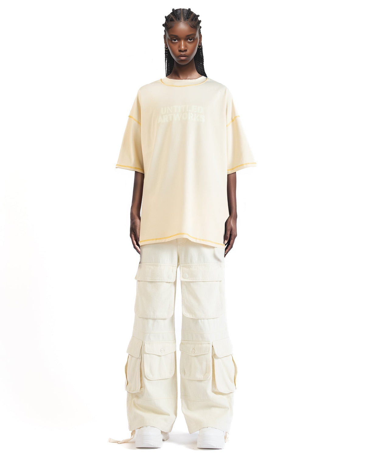 Front view of the Stencil graphic T-shirt showcasing its pleated front detail and stencil print